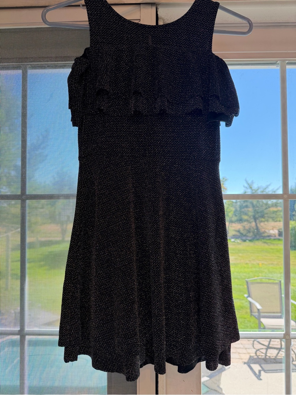 Sleeveless Black Ruffle Fit-and-Flare Dress. Bin 76